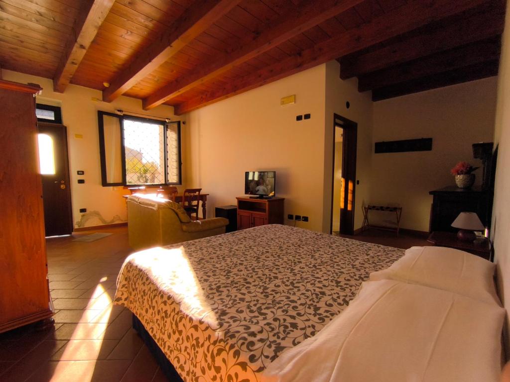 Letto o letti in una camera di Volivia Relais