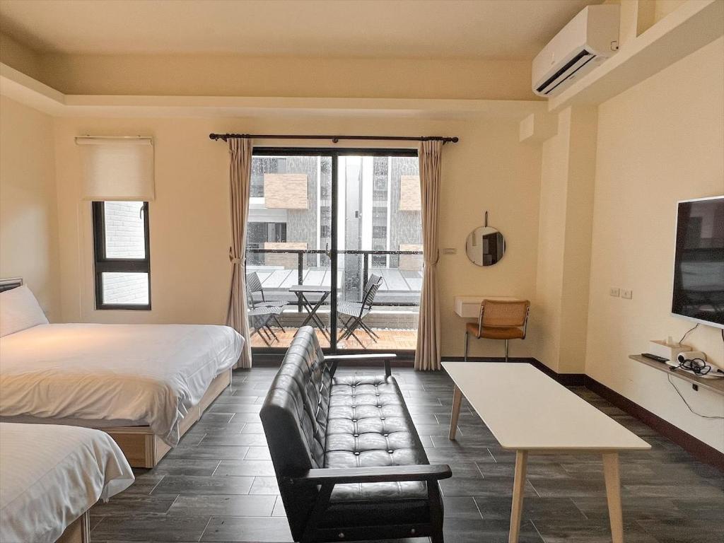 Postel nebo postele na pokoji v ubytování Kaile Roaming Homestay