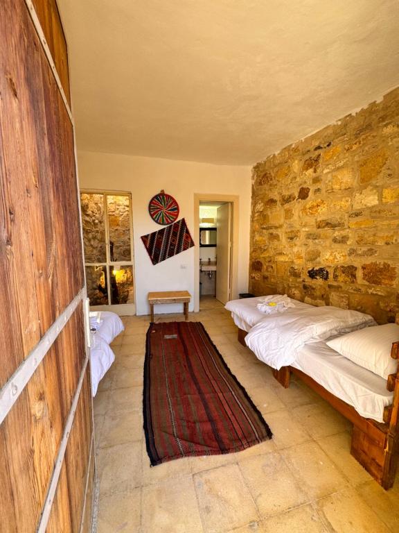 Postel nebo postele na pokoji v ubytování Dana Tower Hotel
