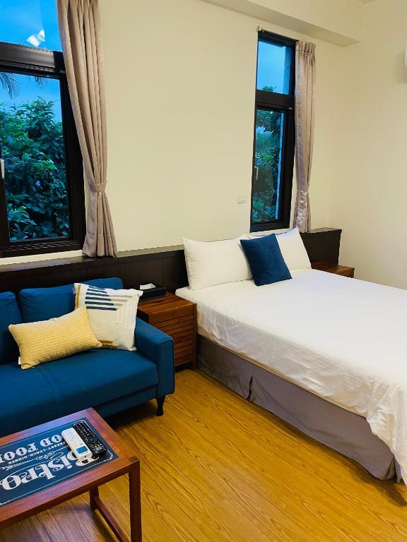 Postel nebo postele na pokoji v ubytování Landay Homestay