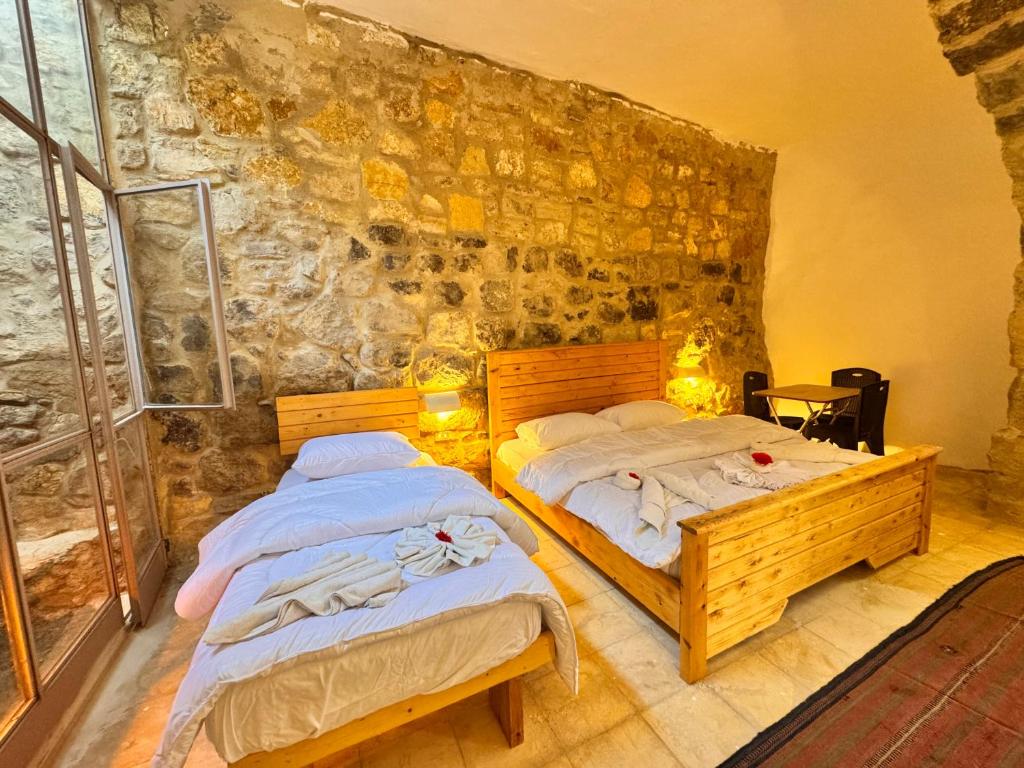 Postel nebo postele na pokoji v ubytování Dana Tower Hotel