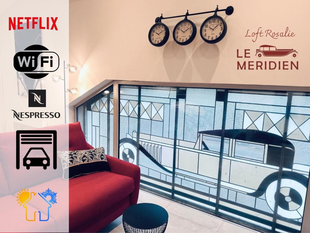 een kamer met een rode bank en klokken aan de muur bij Loft ROSALIE - Le Méridien #Parking #Lave-linge #Clim #Netflix in Charbonnières-les-Bains