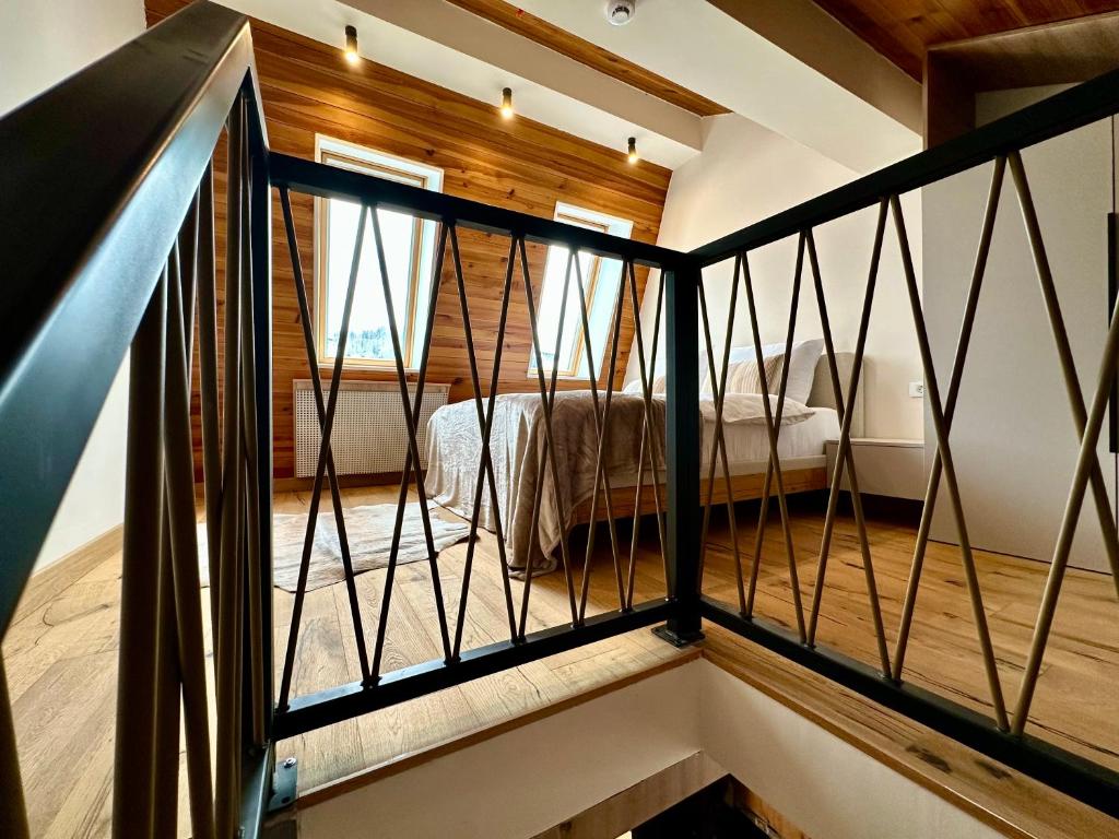 Postel nebo postele na pokoji v ubytování MIA Suites Jahorina