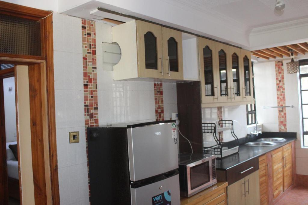 Köök või kööginurk majutusasutuses Eshborns House - Near Jomo Kenyatta International Airport and SGR with shuttle services