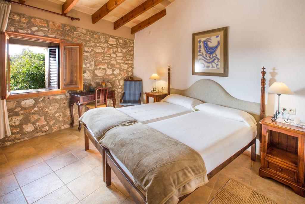Postel nebo postele na pokoji v ubytování Sa Carrotja - Adults Only