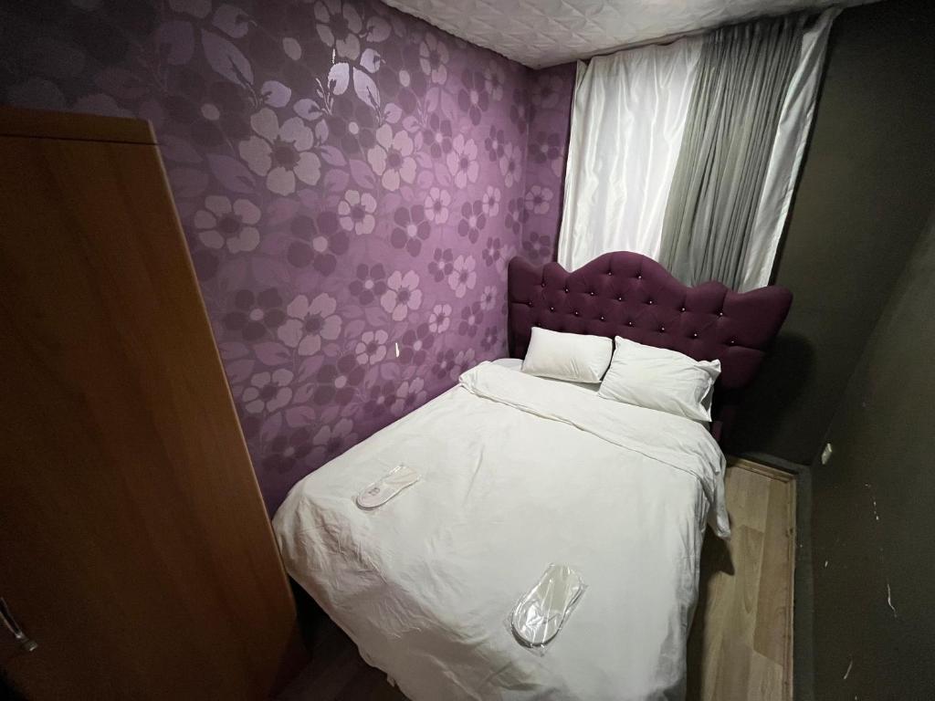 Postel nebo postele na pokoji v ubytování al khalej otel