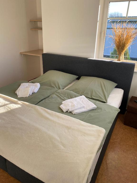Postel nebo postele na pokoji v ubytování Ferienoberwohnung in Villa Pesca