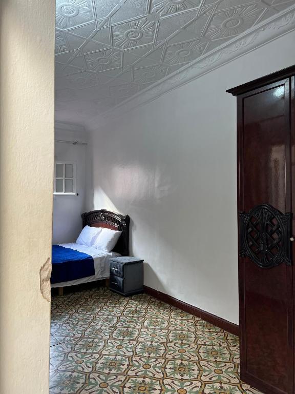 Postel nebo postele na pokoji v ubytování Riad Blue Garden