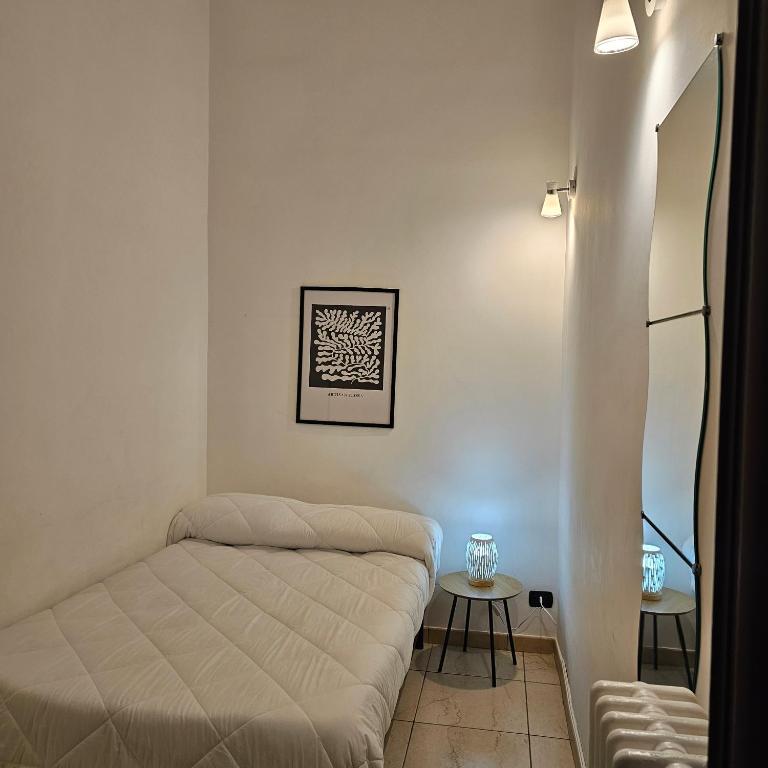 Postel nebo postele na pokoji v ubytování Duca70 "Suite Home"