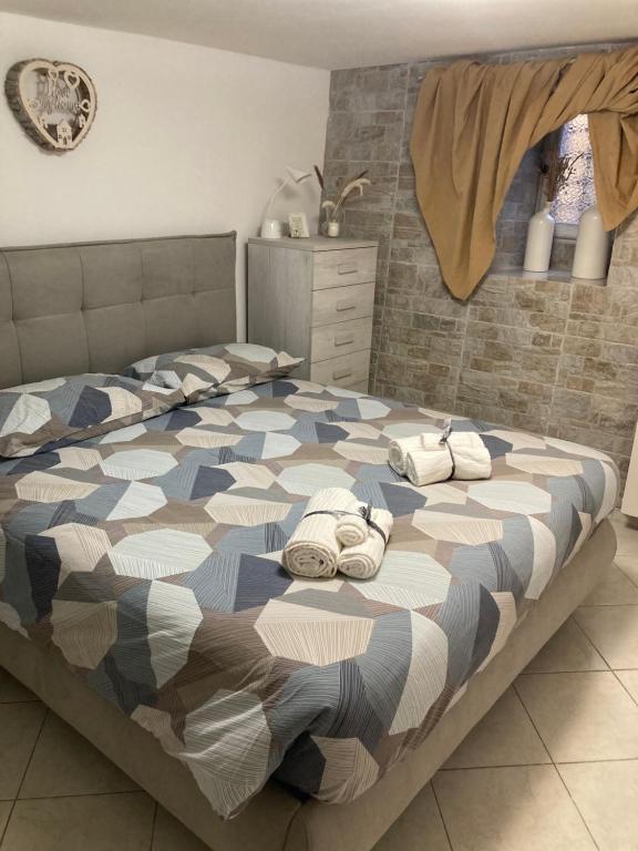 Postel nebo postele na pokoji v ubytování A casa di Peppetto