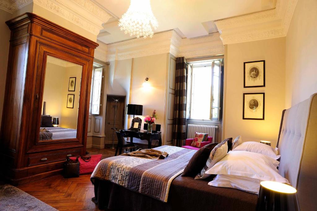 Postel nebo postele na pokoji v ubytování Château Clément - Teritoria