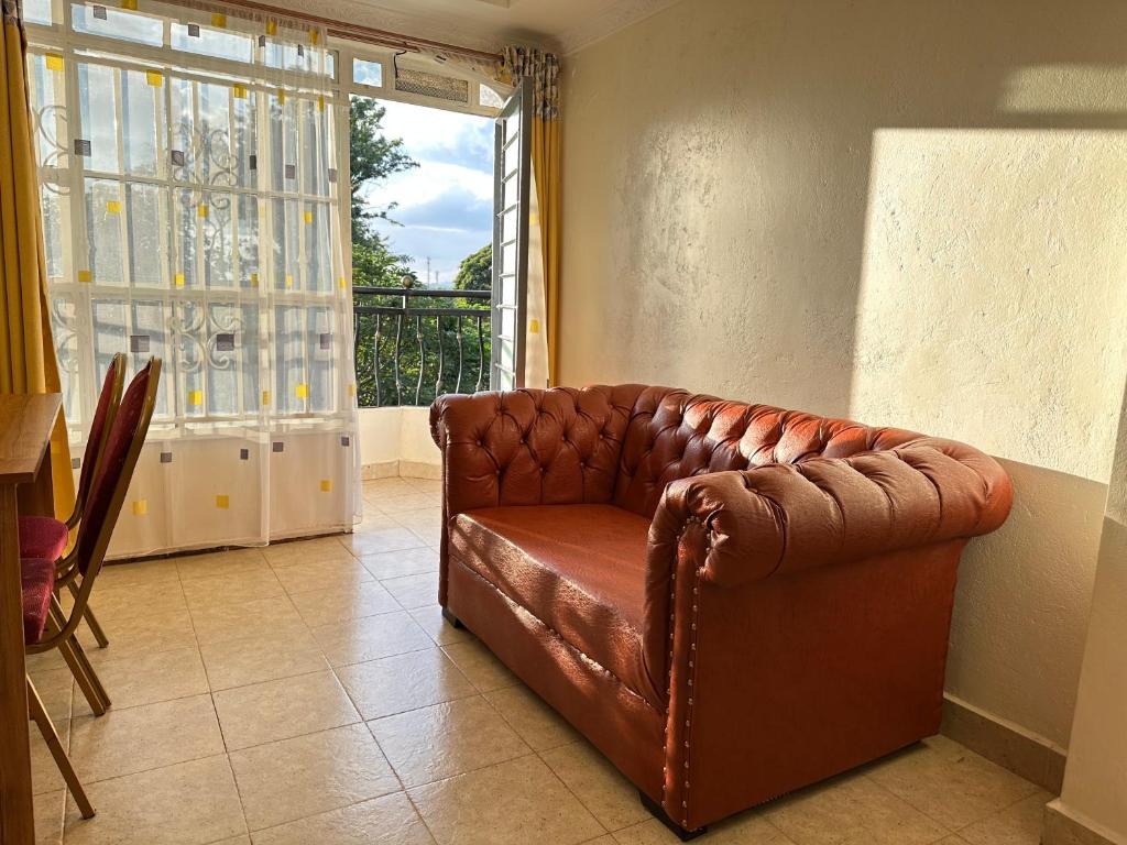 Posezení v ubytování Maanet Gardens Hotel