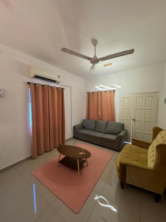 Χώρος καθιστικού στο FHS Homestay Trong Taiping