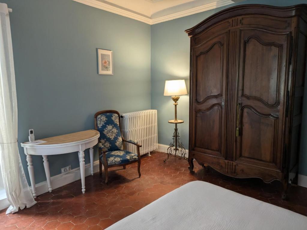Postel nebo postele na pokoji v ubytování Le Domaine du Soulier -Gîte et chambres d'hôtes - La Maison du Gardien