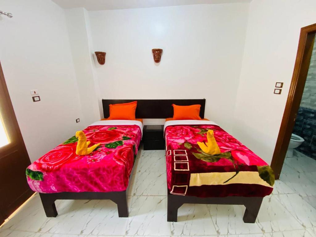 Letto o letti in una camera di sunset guest house