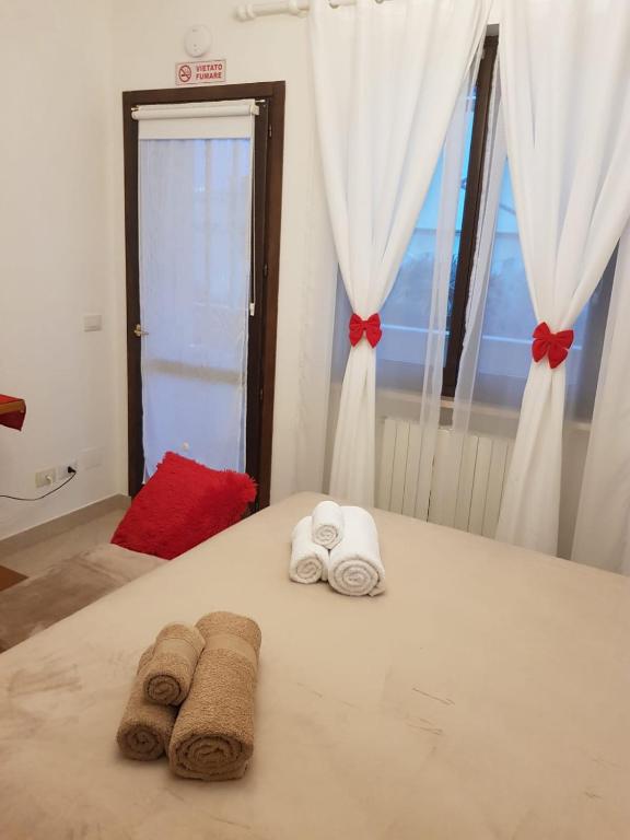 Postel nebo postele na pokoji v ubytování B&B Galateo