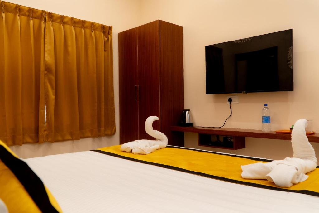 TV a/nebo společenská místnost v ubytování UJ Pallazzio - Business Class Luxury Hotel