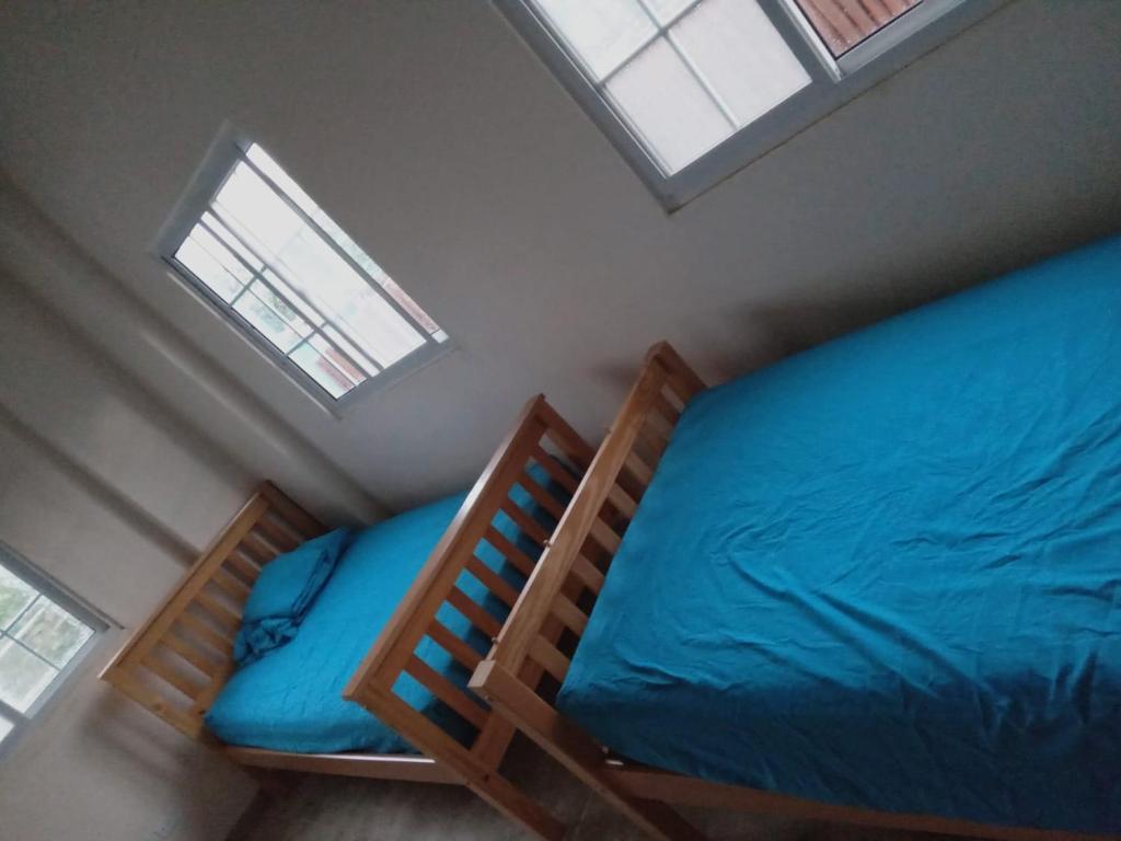 Postel nebo postele na pokoji v ubytování Casa Azul Miguel de la Borda