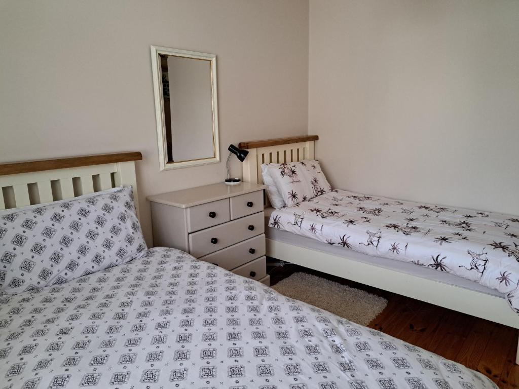 Llit o llits en una habitació de Bearstone House
