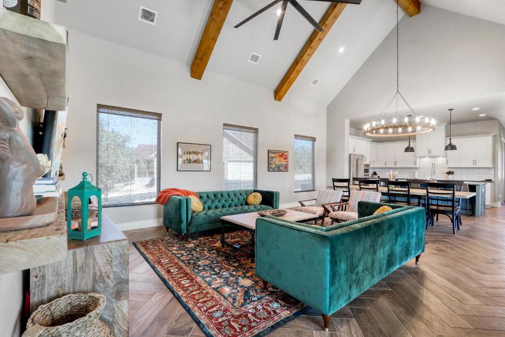 a living room with a couch and a table at Here Comes the Sun in Canyon Lake
