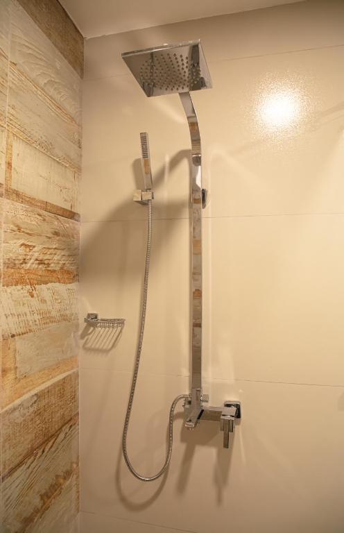 Koupelna v ubytování Ravo Hotel