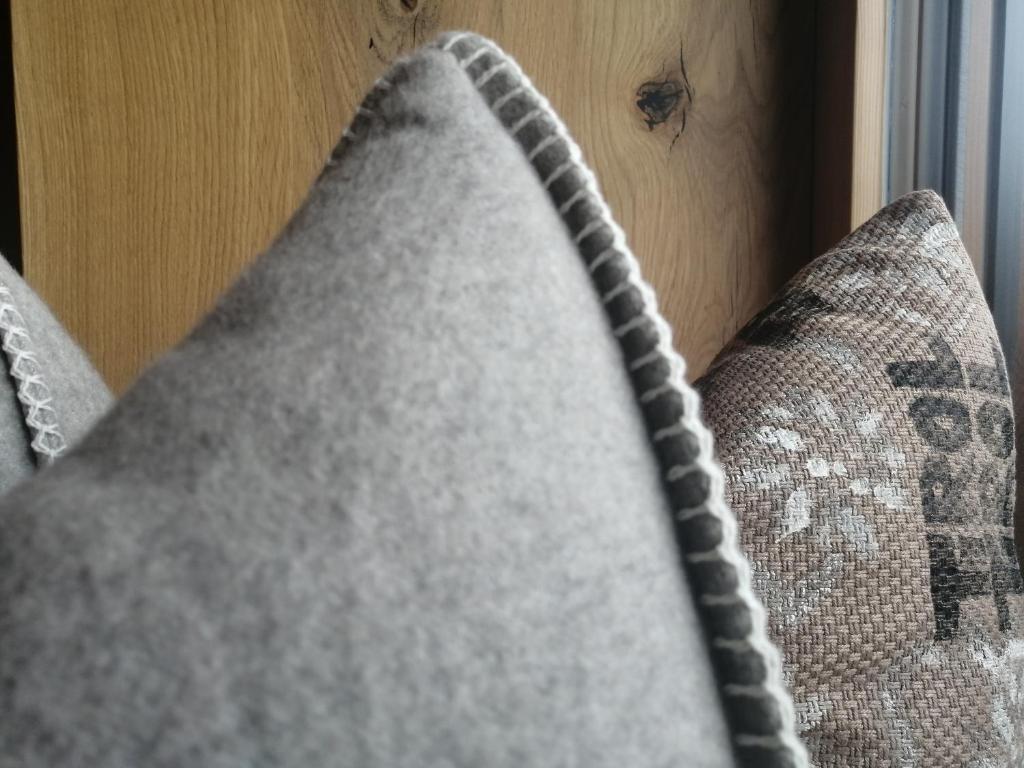 Postel nebo postele na pokoji v ubytování Huber - Das Tiroler B&B