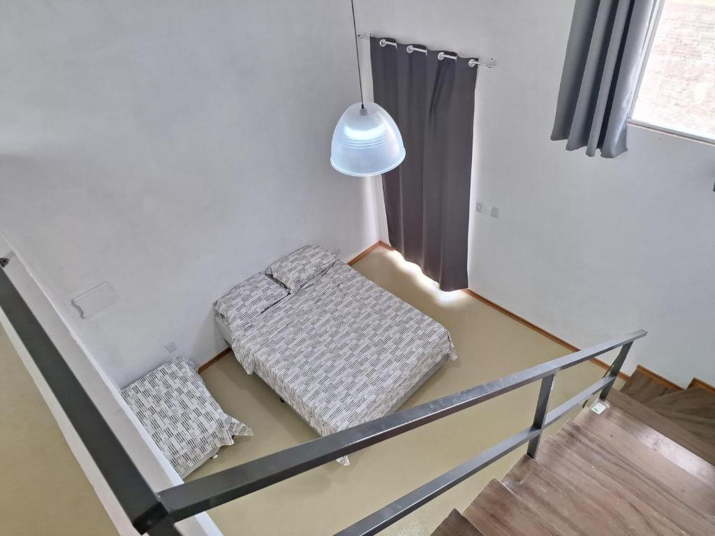 Ένα ή περισσότερα κρεβάτια σε δωμάτιο στο Lofts