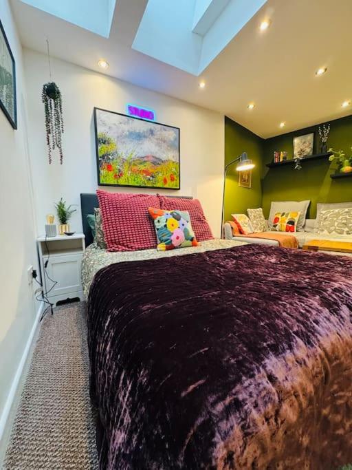 a bedroom with a large bed in a room at #11 Impressive and Spacious Studio Sleeps 4 - Perfect for Contractors and Families - Free Parking in Birmingham
