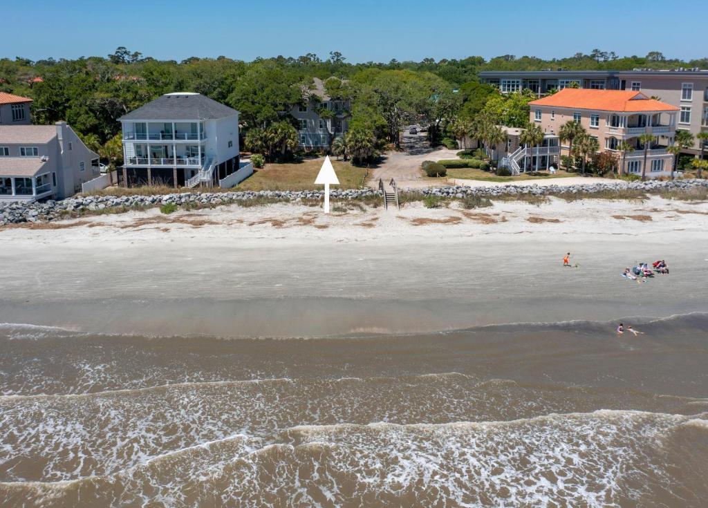an aerial view of a beach with houses at Viewpoint Oaks - 301 7th Street, Unit 101 in Saint Simons