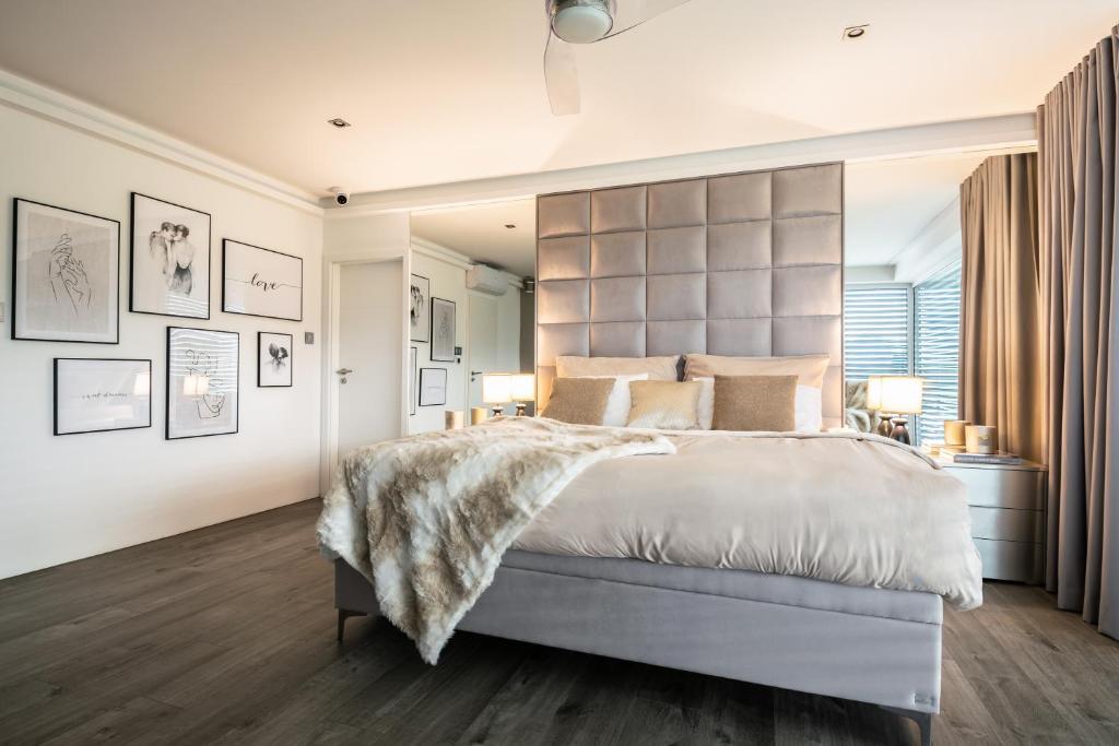 Ένα ή περισσότερα κρεβάτια σε δωμάτιο στο SUPERVILLA Liptov