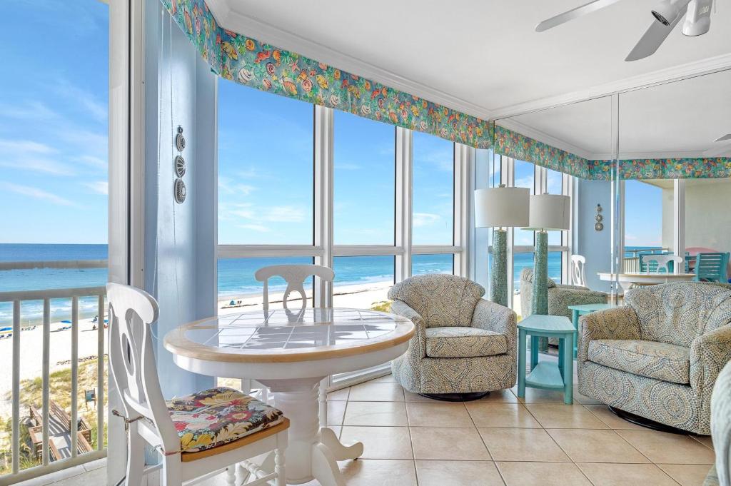 a living room with a view of the ocean at SeaSpray West 603- Gulf Front in Perdido Key