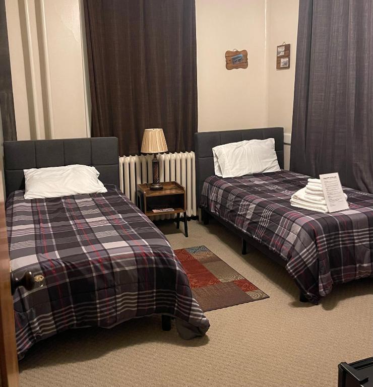 Postel nebo postele na pokoji v ubytování Prescott House ADK