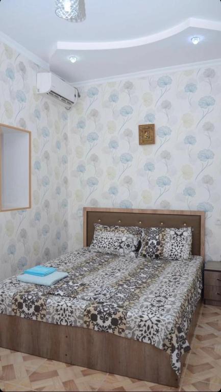 Postel nebo postele na pokoji v ubytování Kutaisi Best Guesthouse