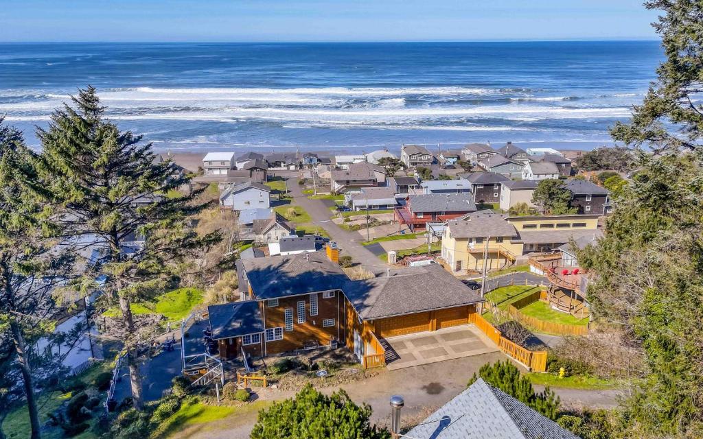 an aerial view of a house with the ocean at Neptunes Grand View in Lincoln City