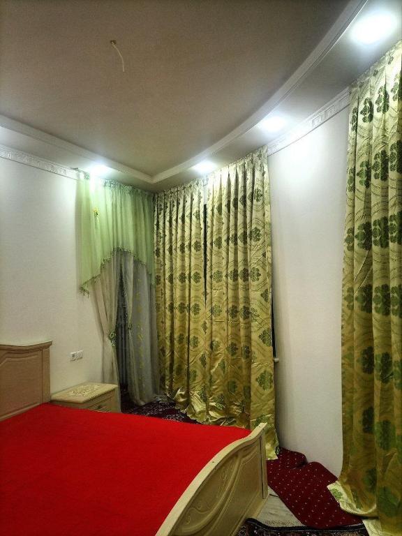 Llit o llits en una habitació de Guest house