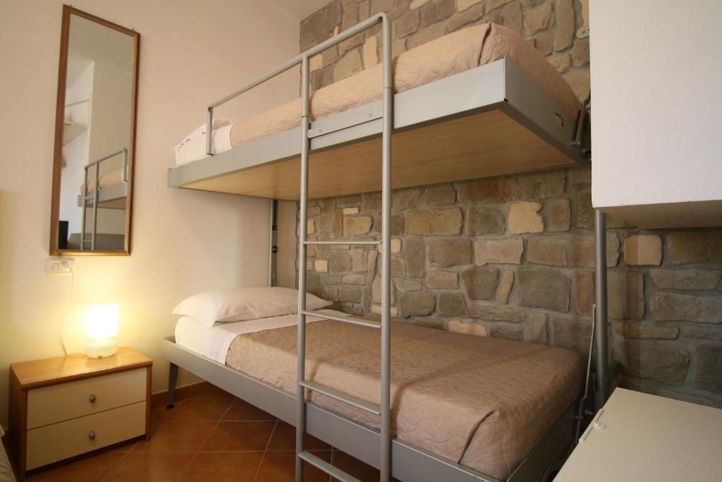 Postel nebo postele na pokoji v ubytování Conero Camere