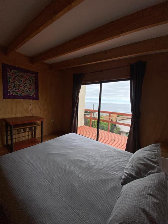 Postel nebo postele na pokoji v ubytování Cabañas Cerro Tacna