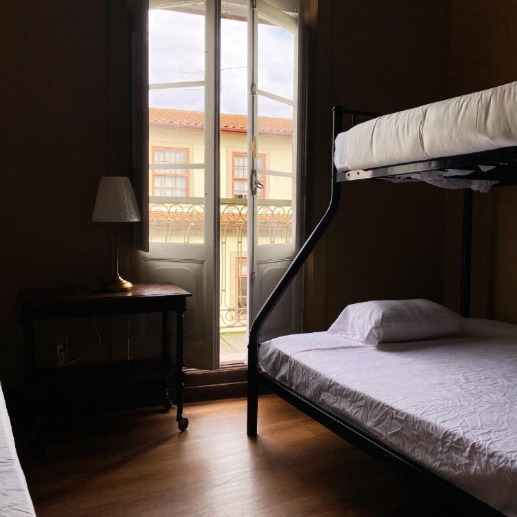 Postel nebo postele na pokoji v ubytování Casa Quixote