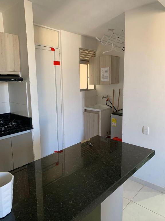 Kuchyň nebo kuchyňský kout v ubytování Hermoso Apartamento en Valledupar