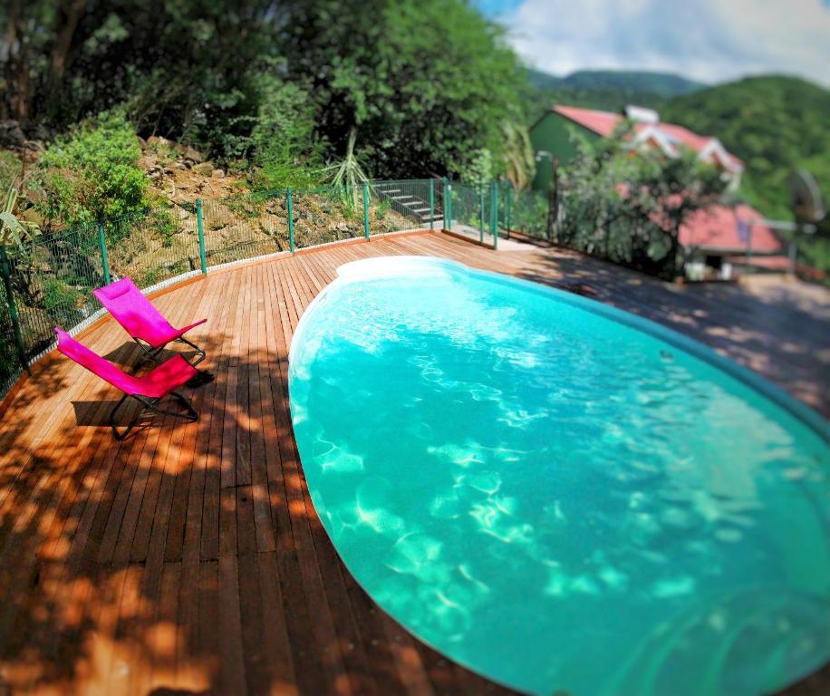 Piscina de la sau aproape de Duplex Toti la - TropicalKaz Guadeloupe