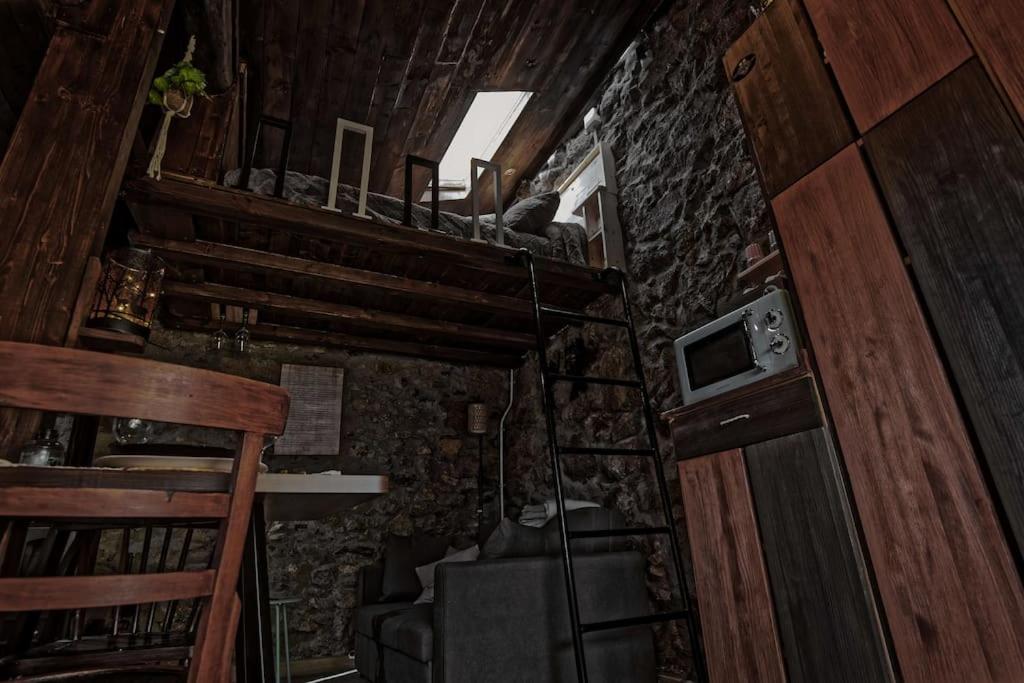 Kuchyň nebo kuchyňský kout v ubytování cabaña do rei