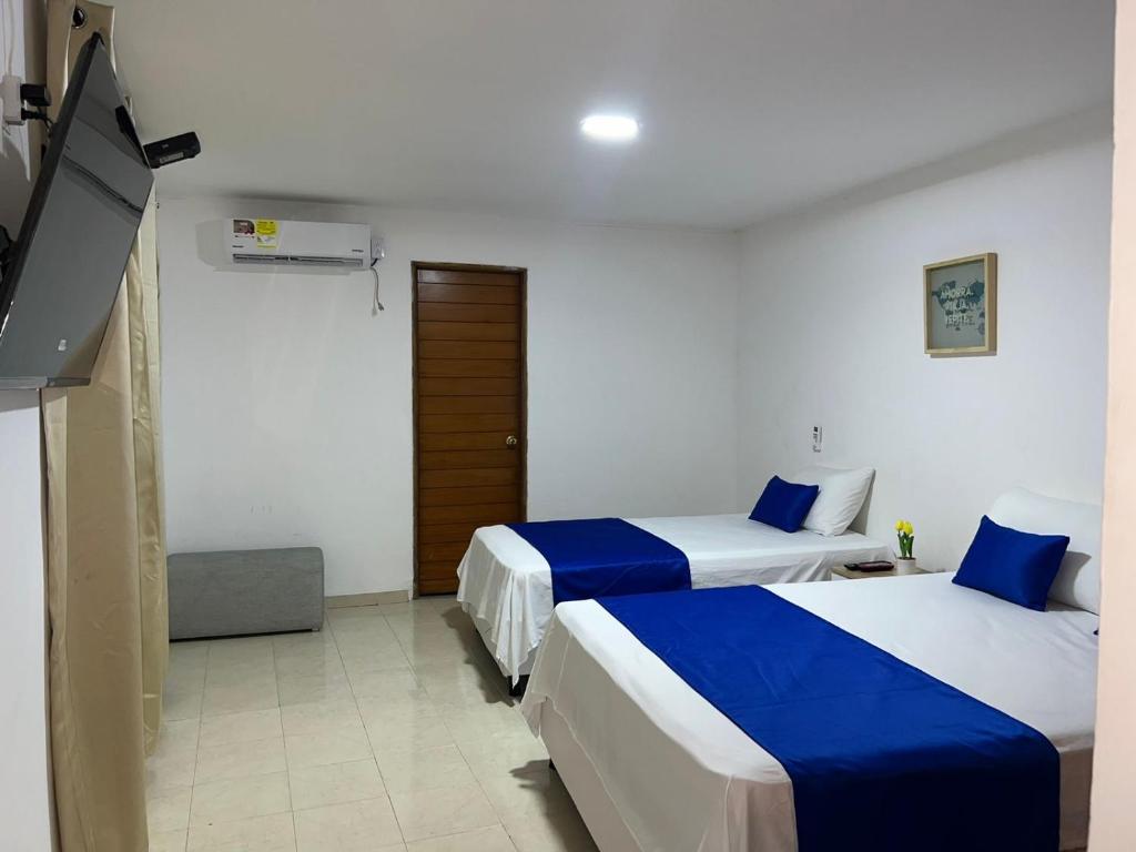 Postel nebo postele na pokoji v ubytování Apartaestudio campestre