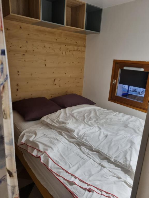 Postel nebo postele na pokoji v ubytování Les Grenadines 2