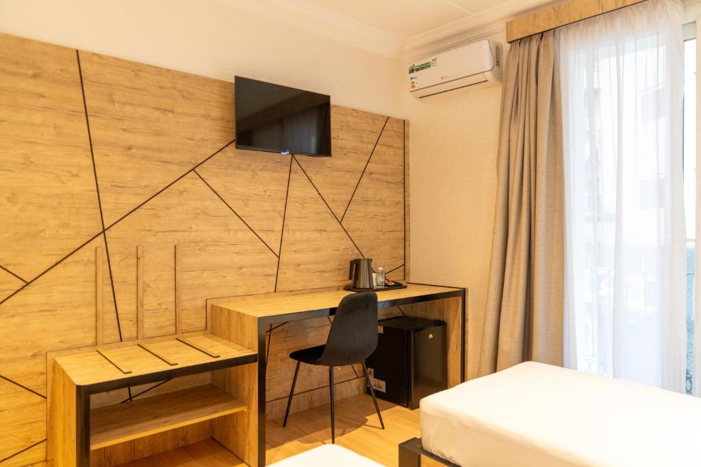 TV o dispositivi per l'intrattenimento presso Hotel Charf