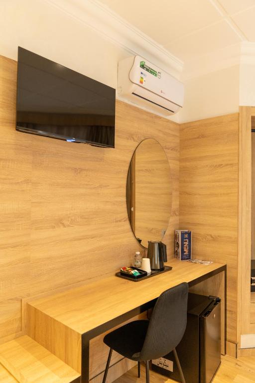 TV o dispositivi per l'intrattenimento presso Hotel Charf