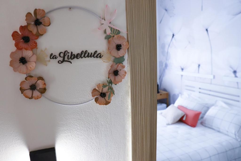 Postel nebo postele na pokoji v ubytování Le Nespole
