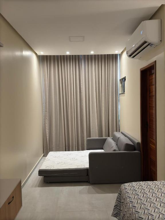 Postel nebo postele na pokoji v ubytování Flat em Alter do Chão
