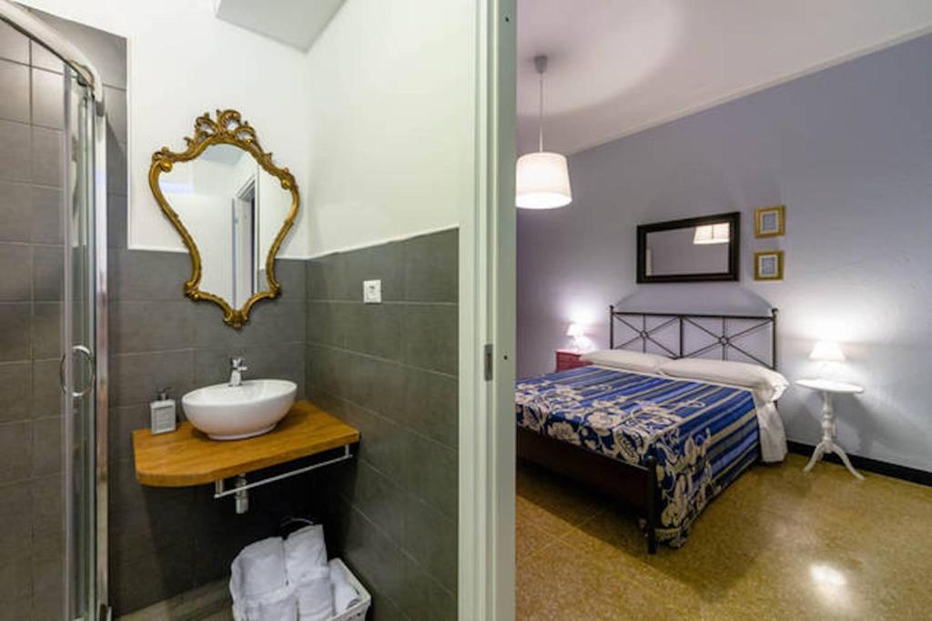 Postel nebo postele na pokoji v ubytování B&B I Portici Di Sottoripa