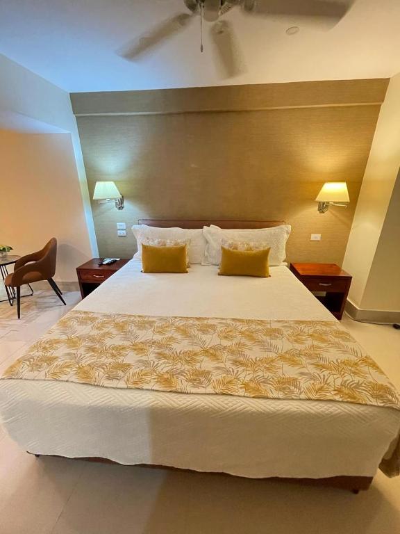 Postel nebo postele na pokoji v ubytování Nilka Hotel Boutique