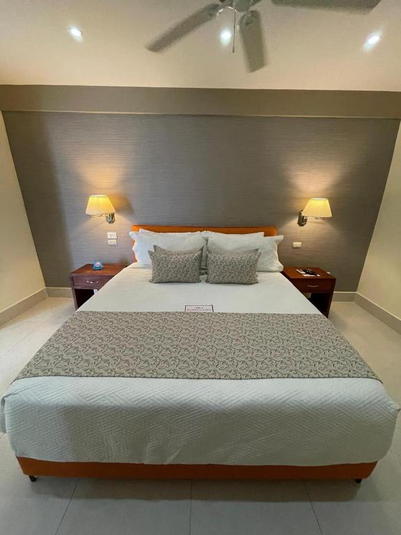 Postel nebo postele na pokoji v ubytování Nilka Hotel Boutique